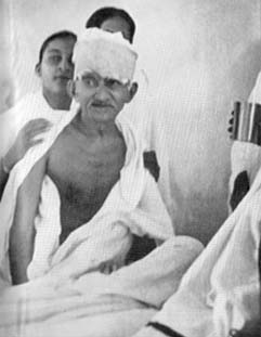 Gandhi breaking his fast, Rajkot, March 7, 1939