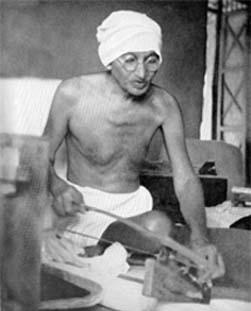 Gandhi spinning with Dhanush Takli, Sevagram, 1940